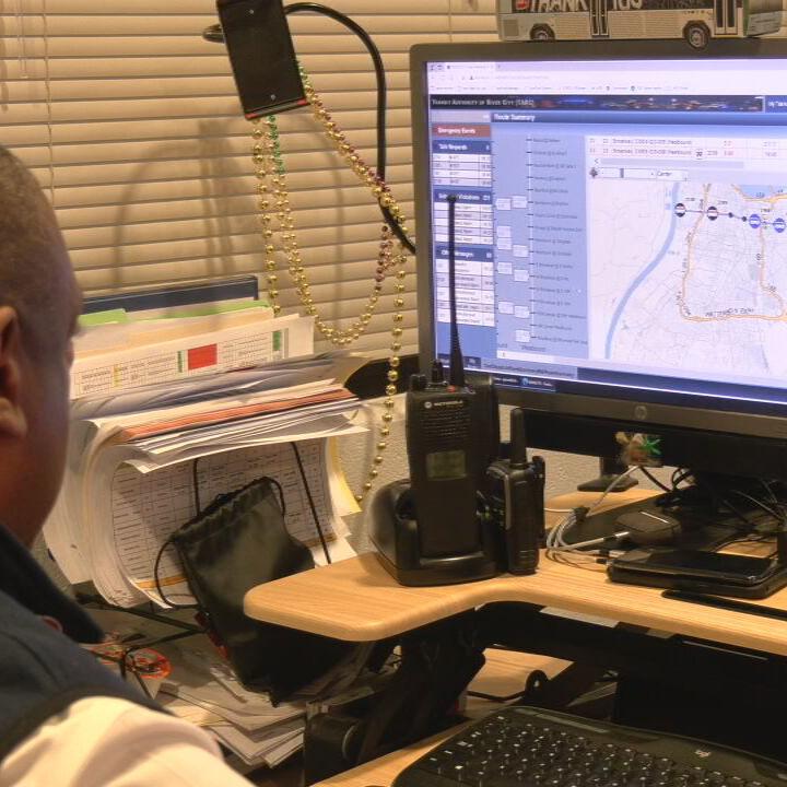 TARC employee at computer screen